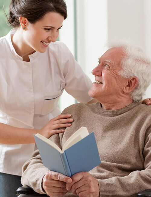Caregiver helping an older man
